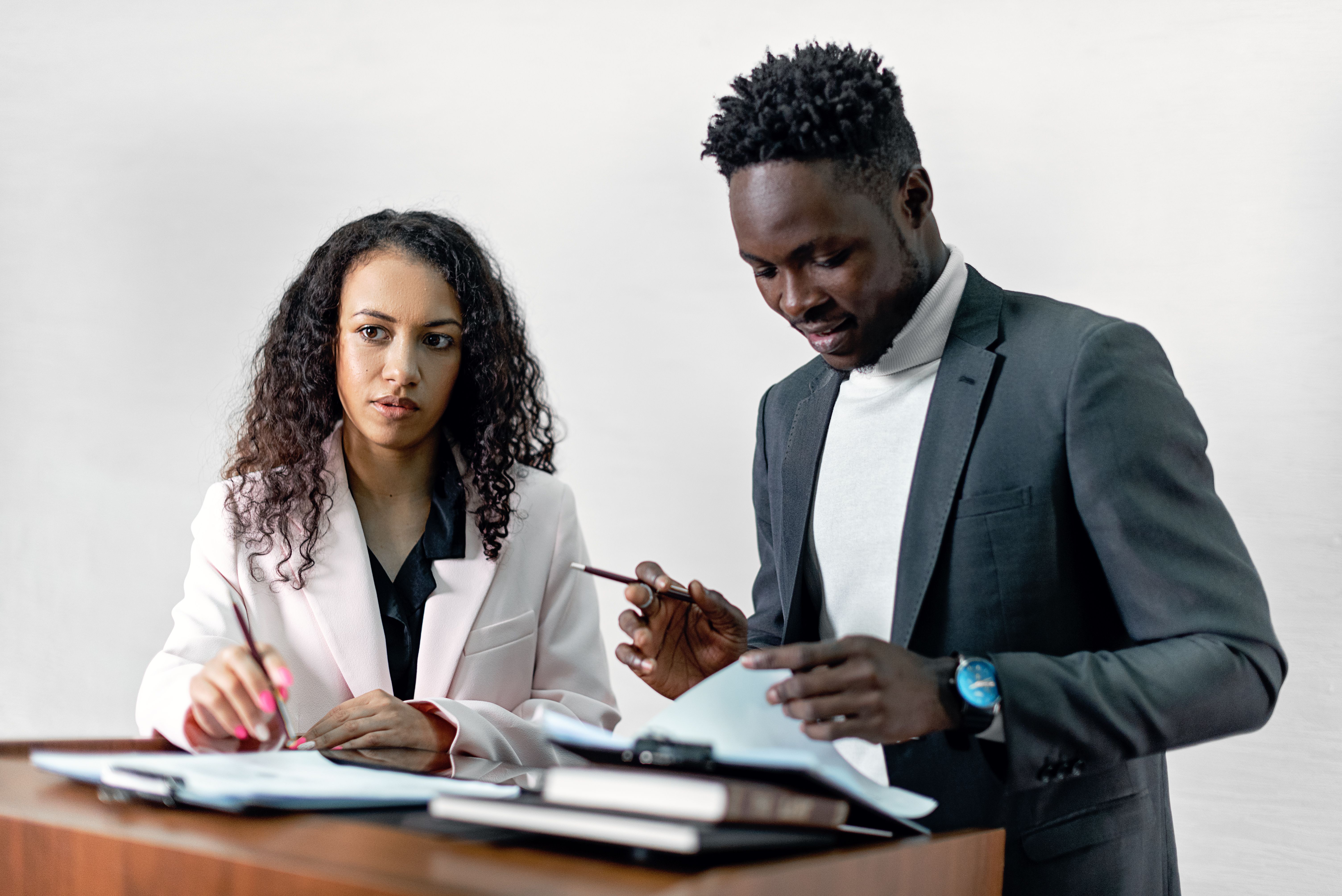 Finance professionals reviewing documents